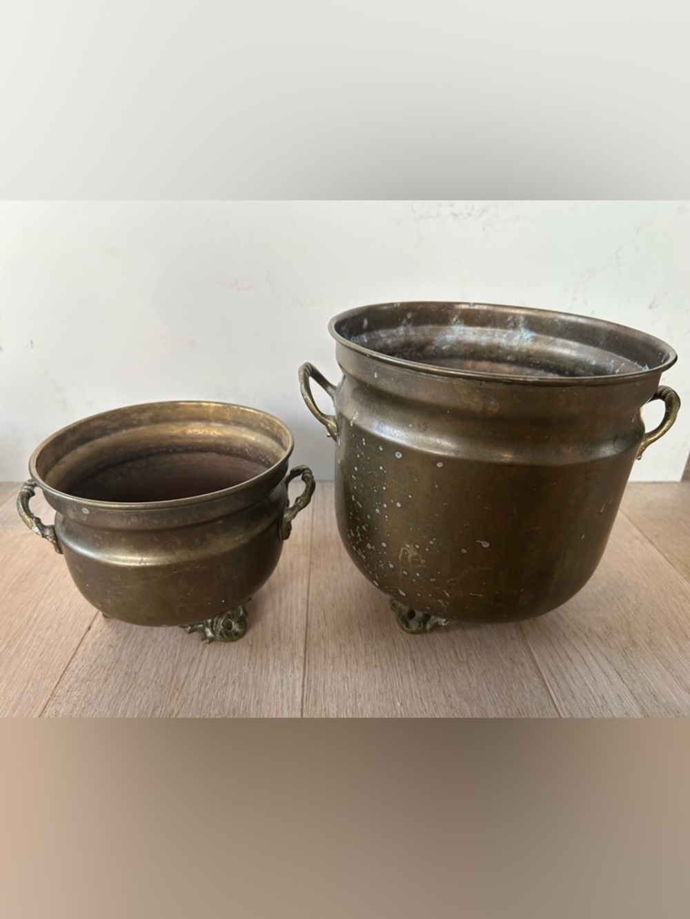 Vintage set of brass footed and handled planters . Made in India